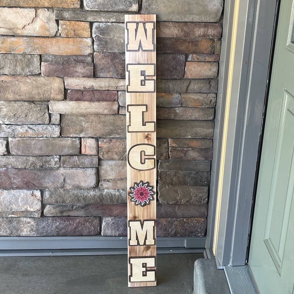 Homemade rustic wooden welcome sign